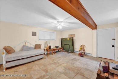 116 Spyglass Hill offers a rarely seen sizable and renovated on Pocono Farms Country Club in Pennsylvania - for sale on GolfHomes.com, golf home, golf lot