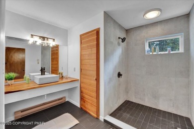 116 Spyglass Hill offers a rarely seen sizable and renovated on Pocono Farms Country Club in Pennsylvania - for sale on GolfHomes.com, golf home, golf lot