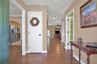 Welcome to 4402 Bluebush Drive. Nestled in the back of the on Baywood Golf Club in North Carolina - for sale on GolfHomes.com, golf home, golf lot