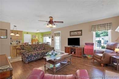 Welcome to 4402 Bluebush Drive. Nestled in the back of the on Baywood Golf Club in North Carolina - for sale on GolfHomes.com, golf home, golf lot
