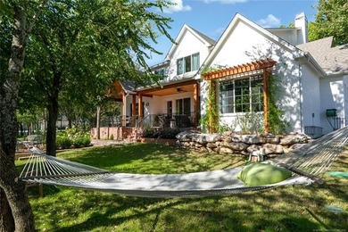 Experience timeless elegance and Southern charm in this on The Patriot in Oklahoma - for sale on GolfHomes.com, golf home, golf lot