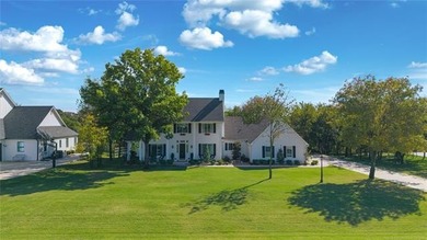 Experience timeless elegance and Southern charm in this on The Patriot in Oklahoma - for sale on GolfHomes.com, golf home, golf lot