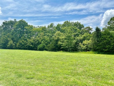 Lush, green, level lot in the sought-after Cedars Valley enclave on Country Club of St Albans in Missouri - for sale on GolfHomes.com, golf home, golf lot