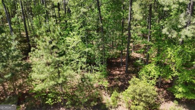 THIS IS A MEMBERSHIP AVAILABLE LOT - Wooded gently sloping to on Reynolds Lake Oconee - The Landing in Georgia - for sale on GolfHomes.com, golf home, golf lot