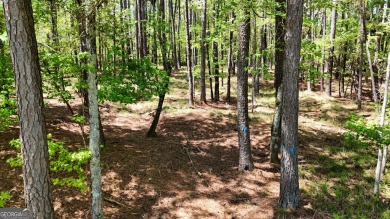 THIS IS A MEMBERSHIP AVAILABLE LOT - Wooded gently sloping to on Reynolds Lake Oconee - The Landing in Georgia - for sale on GolfHomes.com, golf home, golf lot