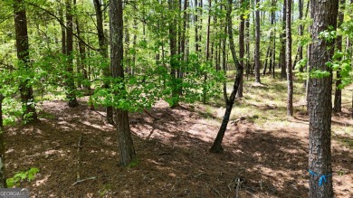 THIS IS A MEMBERSHIP AVAILABLE LOT - Wooded gently sloping to on Reynolds Lake Oconee - The Landing in Georgia - for sale on GolfHomes.com, golf home, golf lot