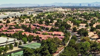 FANTASTIC LOCATION IN NORTHWEST ADJOINING CENTENNIAL HILLS on Painted Desert Golf Club in Nevada - for sale on GolfHomes.com, golf home, golf lot