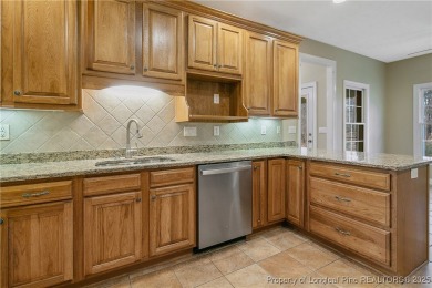 Welcome to this all-brick custom built 4-bedroom, 3-bathroom on Anderson Creek Golf Club in North Carolina - for sale on GolfHomes.com, golf home, golf lot