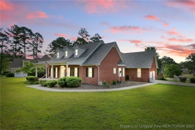 A beautifully updated brick home nestled on a peaceful corner on Kings Grant Golf and Country Club in North Carolina - for sale on GolfHomes.com, golf home, golf lot