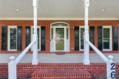 A beautifully updated brick home nestled on a peaceful corner on Kings Grant Golf and Country Club in North Carolina - for sale on GolfHomes.com, golf home, golf lot