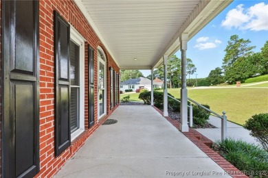 A beautifully updated brick home nestled on a peaceful corner on Kings Grant Golf and Country Club in North Carolina - for sale on GolfHomes.com, golf home, golf lot