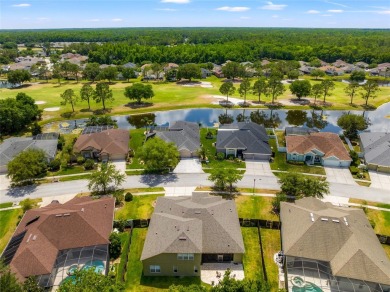 Welcome to 5648 Spectacular Bid Drive, nestled within the on Lexington Oaks Golf Club in Florida - for sale on GolfHomes.com, golf home, golf lot