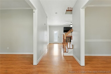 A beautifully updated brick home nestled on a peaceful corner on Kings Grant Golf and Country Club in North Carolina - for sale on GolfHomes.com, golf home, golf lot
