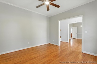 A beautifully updated brick home nestled on a peaceful corner on Kings Grant Golf and Country Club in North Carolina - for sale on GolfHomes.com, golf home, golf lot