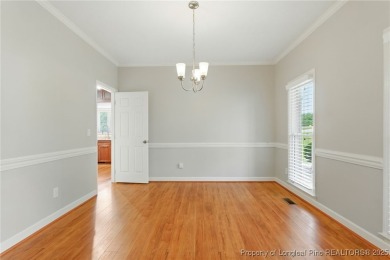 A beautifully updated brick home nestled on a peaceful corner on Kings Grant Golf and Country Club in North Carolina - for sale on GolfHomes.com, golf home, golf lot