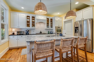 Nestled in the heart of Bald Head Island, this five-bedroom on Bald Head Island Golf Club in North Carolina - for sale on GolfHomes.com, golf home, golf lot