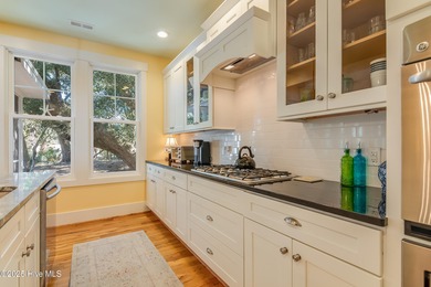 Nestled in the heart of Bald Head Island, this five-bedroom on Bald Head Island Golf Club in North Carolina - for sale on GolfHomes.com, golf home, golf lot