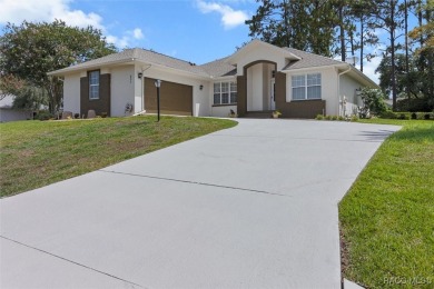 Discover the essence of Florida living in this beautifully on Twisted Oaks Golf Club in Florida - for sale on GolfHomes.com, golf home, golf lot