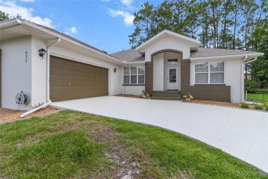 Discover the essence of Florida living in this beautifully on Twisted Oaks Golf Club in Florida - for sale on GolfHomes.com, golf home, golf lot