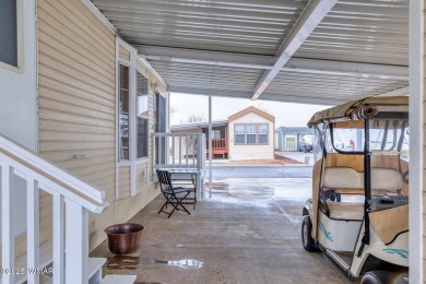 This well-kept park model boasts vaulted ceilings and natural on Juniper Ridge R.V. Golf Resort in Arizona - for sale on GolfHomes.com, golf home, golf lot