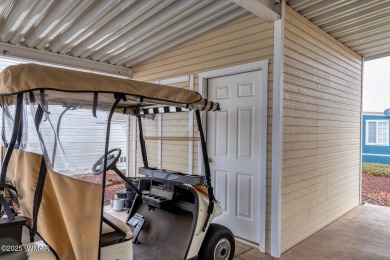 This well-kept park model boasts vaulted ceilings and natural on Juniper Ridge R.V. Golf Resort in Arizona - for sale on GolfHomes.com, golf home, golf lot