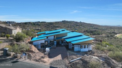 Contemporary new build designed for seamless indoor-outdoor on Eagle Mountain Golf Club in Arizona - for sale on GolfHomes.com, golf home, golf lot