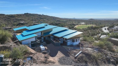 Contemporary new build designed for seamless indoor-outdoor on Eagle Mountain Golf Club in Arizona - for sale on GolfHomes.com, golf home, golf lot