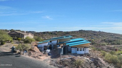 Contemporary new build designed for seamless indoor-outdoor on Eagle Mountain Golf Club in Arizona - for sale on GolfHomes.com, golf home, golf lot