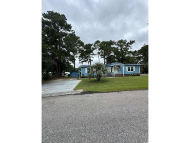 New to the Market!! This is the Coastal Beach Life at its best! on Indigo Creek Golf Club in South Carolina - for sale on GolfHomes.com, golf home, golf lot