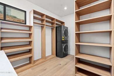 Contemporary new build designed for seamless indoor-outdoor on Eagle Mountain Golf Club in Arizona - for sale on GolfHomes.com, golf home, golf lot