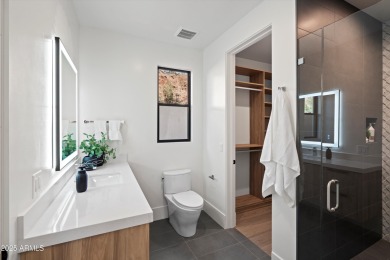 Contemporary new build designed for seamless indoor-outdoor on Eagle Mountain Golf Club in Arizona - for sale on GolfHomes.com, golf home, golf lot