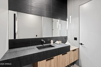 Contemporary new build designed for seamless indoor-outdoor on Eagle Mountain Golf Club in Arizona - for sale on GolfHomes.com, golf home, golf lot