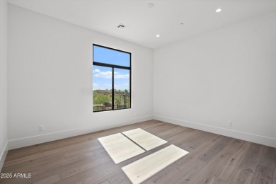 Contemporary new build designed for seamless indoor-outdoor on Eagle Mountain Golf Club in Arizona - for sale on GolfHomes.com, golf home, golf lot