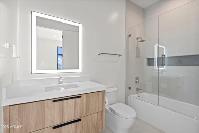 Contemporary new build designed for seamless indoor-outdoor on Eagle Mountain Golf Club in Arizona - for sale on GolfHomes.com, golf home, golf lot