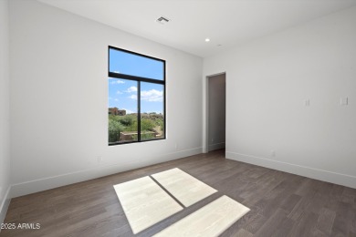 Contemporary new build designed for seamless indoor-outdoor on Eagle Mountain Golf Club in Arizona - for sale on GolfHomes.com, golf home, golf lot