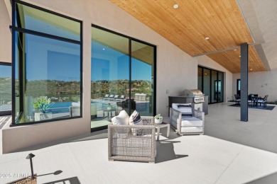 Contemporary new build designed for seamless indoor-outdoor on Eagle Mountain Golf Club in Arizona - for sale on GolfHomes.com, golf home, golf lot