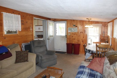 This 2 bedroom 1.5 bath Chariot Eagle Park Model with attached on Indian Mound Golf Club in New Hampshire - for sale on GolfHomes.com, golf home, golf lot