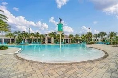 Welcome home to The Ibis Model at Waterleigh! This beautiful on Orange County National Golf Center and Lodge in Florida - for sale on GolfHomes.com, golf home, golf lot