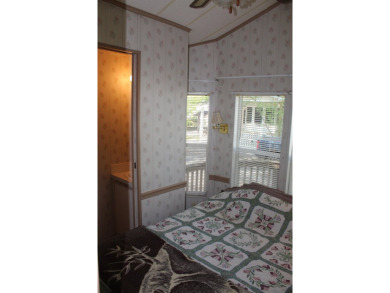 This 2 bedroom 1.5 bath Chariot Eagle Park Model with attached on Indian Mound Golf Club in New Hampshire - for sale on GolfHomes.com, golf home, golf lot