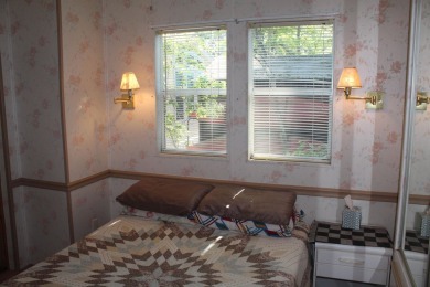 This 2 bedroom 1.5 bath Chariot Eagle Park Model with attached on Indian Mound Golf Club in New Hampshire - for sale on GolfHomes.com, golf home, golf lot