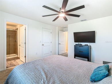 Welcome home to The Ibis Model at Waterleigh! This beautiful on Orange County National Golf Center and Lodge in Florida - for sale on GolfHomes.com, golf home, golf lot