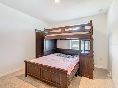 Welcome home to The Ibis Model at Waterleigh! This beautiful on Orange County National Golf Center and Lodge in Florida - for sale on GolfHomes.com, golf home, golf lot