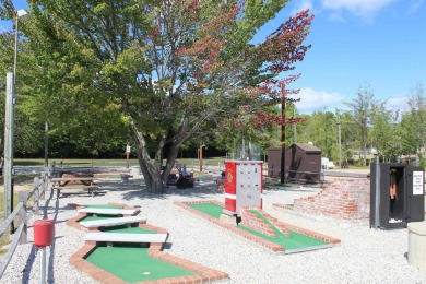 This 2 bedroom 1.5 bath Chariot Eagle Park Model with attached on Indian Mound Golf Club in New Hampshire - for sale on GolfHomes.com, golf home, golf lot