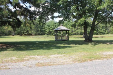 This 2 bedroom 1.5 bath Chariot Eagle Park Model with attached on Indian Mound Golf Club in New Hampshire - for sale on GolfHomes.com, golf home, golf lot