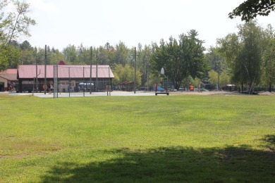 This 2 bedroom 1.5 bath Chariot Eagle Park Model with attached on Indian Mound Golf Club in New Hampshire - for sale on GolfHomes.com, golf home, golf lot