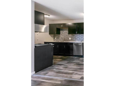 A must see! Charming move-in ready and yet affordable top floor on Brookview Golf Course - Brookview in Minnesota - for sale on GolfHomes.com, golf home, golf lot