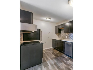 A must see! Charming move-in ready and yet affordable top floor on Brookview Golf Course - Brookview in Minnesota - for sale on GolfHomes.com, golf home, golf lot