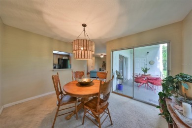 Discover serene and low-maintenance lakeside living in the heart on Clearwater Executive Golf Course in Florida - for sale on GolfHomes.com, golf home, golf lot