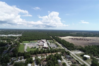 Unleash Your Investment Potential: Multi-Family Development on Oak Hills Country Club in Florida - for sale on GolfHomes.com, golf home, golf lot