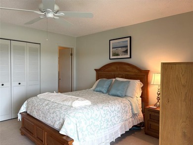 Beautiful Lake and Golf Course Views From This Two Bedroom / Two on The American Golf Club in Florida - for sale on GolfHomes.com, golf home, golf lot